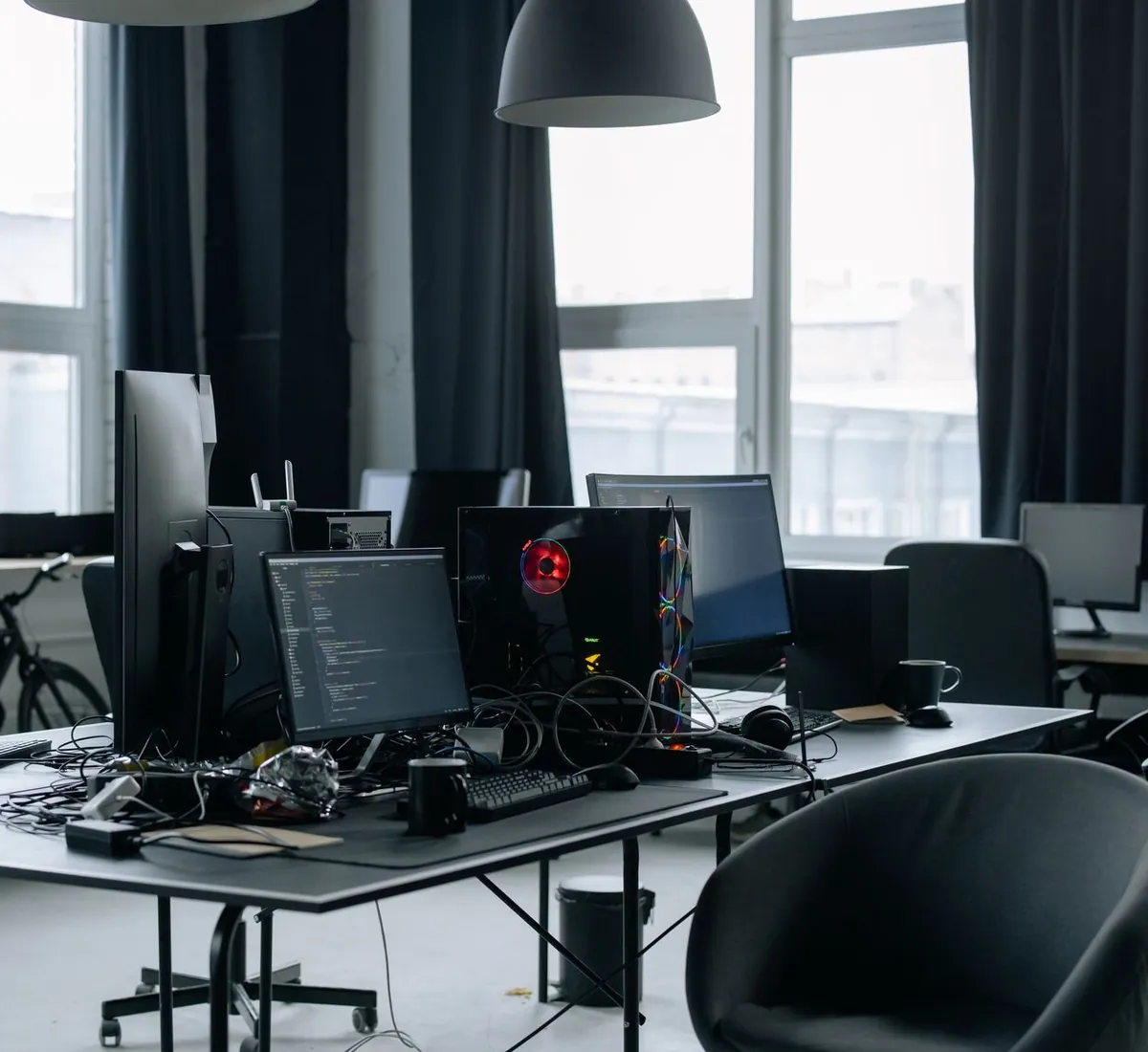 Workstations with multiple monitors in a technology studio office